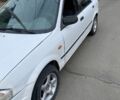Білий Мазда 323, об'ємом двигуна 1.49 л та пробігом 400 тис. км за 1100 $, фото 1 на Automoto.ua
