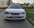 Белый Мазда 323, объемом двигателя 2 л и пробегом 280 тыс. км за 2300 $, фото 1 на Automoto.ua
