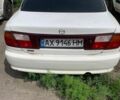 Белый Мазда 323, объемом двигателя 1.5 л и пробегом 235 тыс. км за 500 $, фото 1 на Automoto.ua
