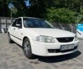 Білий Мазда 323, об'ємом двигуна 1.5 л та пробігом 270 тис. км за 1500 $, фото 1 на Automoto.ua