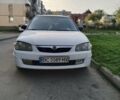 Білий Мазда 323, об'ємом двигуна 2 л та пробігом 280 тис. км за 2300 $, фото 1 на Automoto.ua