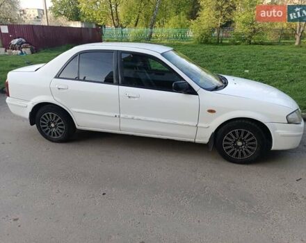 Белый Мазда 323, объемом двигателя 2 л и пробегом 280 тыс. км за 2500 $, фото 2 на Automoto.ua