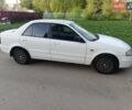 Белый Мазда 323, объемом двигателя 2 л и пробегом 280 тыс. км за 2500 $, фото 2 на Automoto.ua