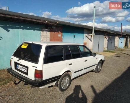 Білий Мазда 323, об'ємом двигуна 1.7 л та пробігом 440 тис. км за 1500 $, фото 1 на Automoto.ua