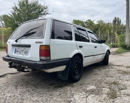Білий Мазда 323, об'ємом двигуна 1.6 л та пробігом 293 тис. км за 1806 $, фото 3 на Automoto.ua