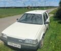Белый Мазда 323, объемом двигателя 0 л и пробегом 100 тыс. км за 700 $, фото 1 на Automoto.ua