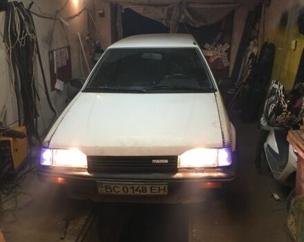 Белый Мазда 323, объемом двигателя 1.7 л и пробегом 300 тыс. км за 1200 $, фото 2 на Automoto.ua