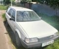 Белый Мазда 323, объемом двигателя 0 л и пробегом 100 тыс. км за 700 $, фото 2 на Automoto.ua