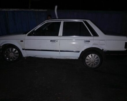 Белый Мазда 323, объемом двигателя 0 л и пробегом 312 тыс. км за 290 $, фото 2 на Automoto.ua