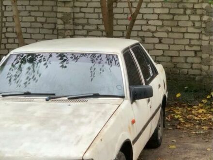 Белый Мазда 323, объемом двигателя 1.8 л и пробегом 2 тыс. км за 476 $, фото 1 на Automoto.ua