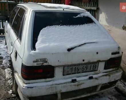 Белый Мазда 323, объемом двигателя 1.5 л и пробегом 333 тыс. км за 300 $, фото 1 на Automoto.ua