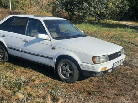 Мазда 323 1986 у Павлограде на Automoto.ua Білий Мазда 323, об'ємом двигуна 1.3 л та пробігом 3 тис. км за 1257 $, фото 1 на Automoto.ua