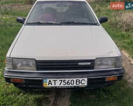 Белый Мазда 323, объемом двигателя 1.5 л и пробегом 180 тыс. км за 600 $, фото 1 на Automoto.ua