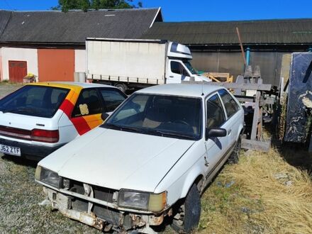 Белый Мазда 323, объемом двигателя 1.7 л и пробегом 500 тыс. км за 214 $, фото 1 на Automoto.ua