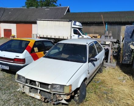 Белый Мазда 323, объемом двигателя 1.7 л и пробегом 500 тыс. км за 214 $, фото 1 на Automoto.ua