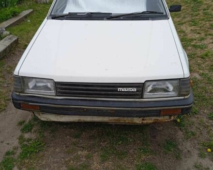 Белый Мазда 323, объемом двигателя 6 л и пробегом 252 тыс. км за 503 $, фото 1 на Automoto.ua