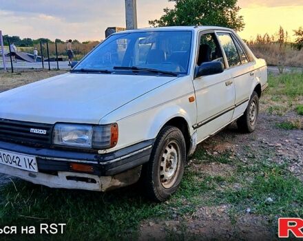 Білий Мазда 323, об'ємом двигуна 1.6 л та пробігом 350 тис. км за 650 $, фото 1 на Automoto.ua
