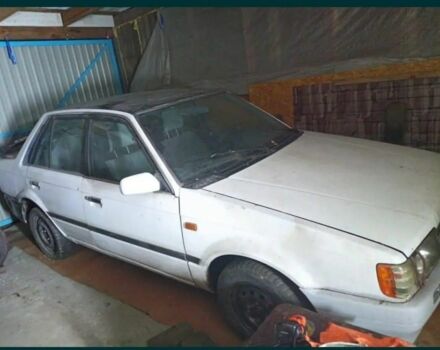 Білий Мазда 323, об'ємом двигуна 1 л та пробігом 200 тис. км за 348 $, фото 1 на Automoto.ua