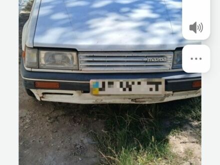 Білий Мазда 323, об'ємом двигуна 1 л та пробігом 324 тис. км за 831 $, фото 1 на Automoto.ua