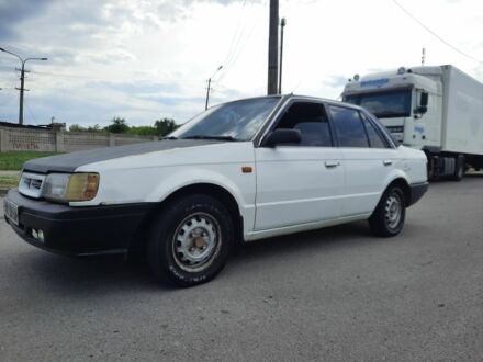 Мазда 323 1987 у Дніпро (Дніпропетровську) на Automoto.ua Білий Мазда 323, об'ємом двигуна 1.3 л та пробігом 245 тис. км за 700 $, фото 1 на Automoto.ua
