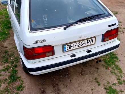 Білий Мазда 323, об'ємом двигуна 1.5 л та пробігом 350 тис. км за 599 $, фото 1 на Automoto.ua