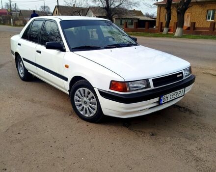 Белый Мазда 323, объемом двигателя 1.8 л и пробегом 88 тыс. км за 1500 $, фото 1 на Automoto.ua