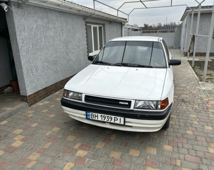 Белый Мазда 323, объемом двигателя 1.8 л и пробегом 3 тыс. км за 2000 $, фото 1 на Automoto.ua