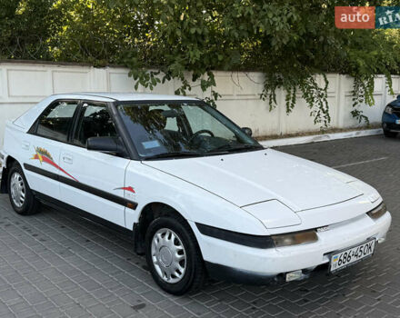 Білий Мазда 323, об'ємом двигуна 0 л та пробігом 191 тис. км за 1950 $, фото 1 на Automoto.ua
