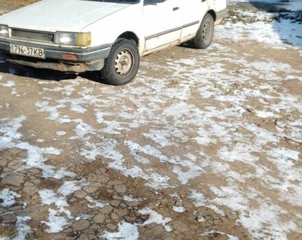 Белый Мазда 323, объемом двигателя 0 л и пробегом 470 тыс. км за 903 $, фото 1 на Automoto.ua