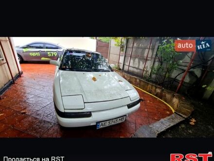Білий Мазда 323, об'ємом двигуна 1.6 л та пробігом 199 тис. км за 1440 $, фото 1 на Automoto.ua