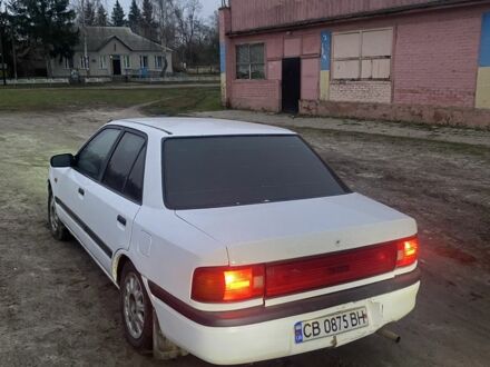 Белый Мазда 323, объемом двигателя 1.6 л и пробегом 999 тыс. км за 1000 $, фото 1 на Automoto.ua