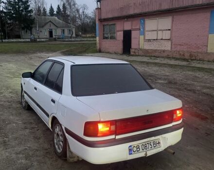 Белый Мазда 323, объемом двигателя 1.6 л и пробегом 999 тыс. км за 1000 $, фото 1 на Automoto.ua