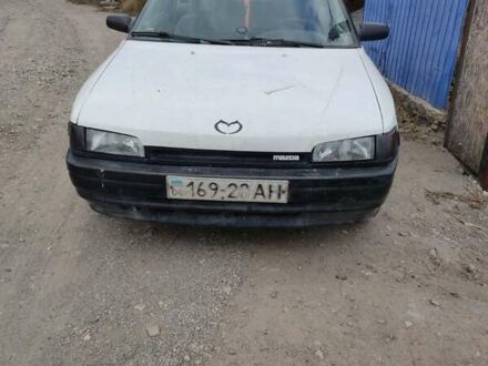Білий Мазда 323, об'ємом двигуна 1.6 л та пробігом 499 тис. км за 500 $, фото 1 на Automoto.ua