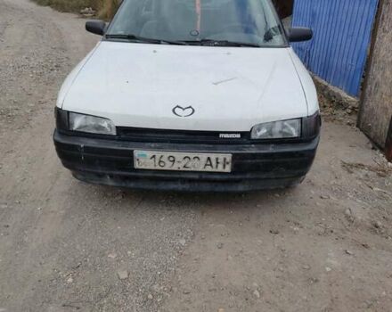 Белый Мазда 323, объемом двигателя 1.6 л и пробегом 499 тыс. км за 500 $, фото 1 на Automoto.ua