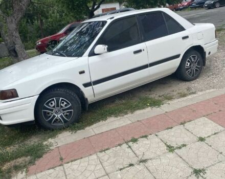 Білий Мазда 323, об'ємом двигуна 1.6 л та пробігом 300 тис. км за 1155 $, фото 1 на Automoto.ua