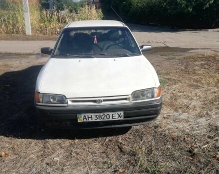 Белый Мазда 323, объемом двигателя 1.7 л и пробегом 200 тыс. км за 1100 $, фото 1 на Automoto.ua