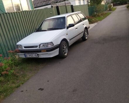 Білий Мазда 323, об'ємом двигуна 1.5 л та пробігом 20 тис. км за 1187 $, фото 1 на Automoto.ua