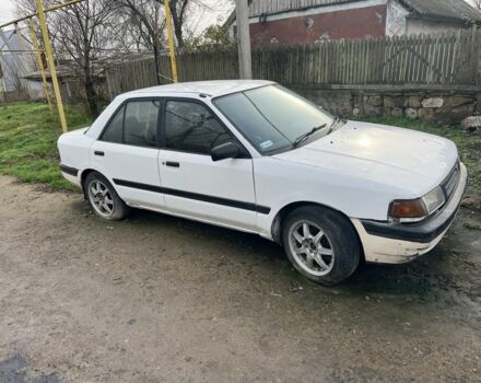 Белый Мазда 323, объемом двигателя 0 л и пробегом 1 тыс. км за 638 $, фото 1 на Automoto.ua