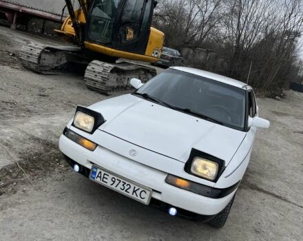 Белый Мазда 323, объемом двигателя 1.8 л и пробегом 250 тыс. км за 1200 $, фото 1 на Automoto.ua