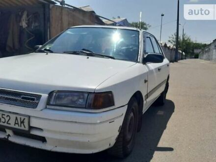 Мазда 323 1992 у Києві на Automoto.ua Білий Мазда 323, об'ємом двигуна 0 л та пробігом 185 тис. км за 2000 $, фото 1 на Automoto.ua