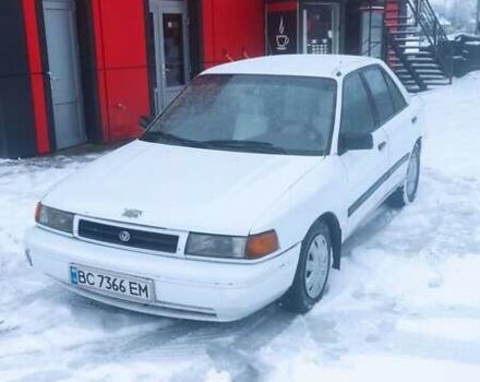 Белый Мазда 323, объемом двигателя 1.84 л и пробегом 250 тыс. км за 1000 $, фото 1 на Automoto.ua
