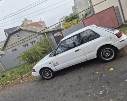 Белый Мазда 323, объемом двигателя 1.6 л и пробегом 298 тыс. км за 1300 $, фото 1 на Automoto.ua