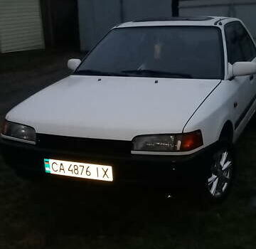 Білий Мазда 323, об'ємом двигуна 1.7 л та пробігом 470 тис. км за 2500 $, фото 1 на Automoto.ua