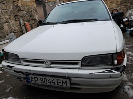 Белый Мазда 323, объемом двигателя 1.7 л и пробегом 600 тыс. км за 800 $, фото 1 на Automoto.ua