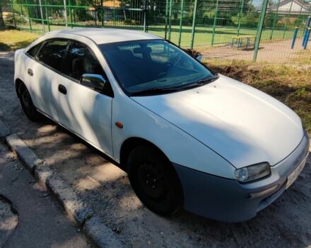 Білий Мазда 323, об'ємом двигуна 1.5 л та пробігом 250 тис. км за 1600 $, фото 1 на Automoto.ua