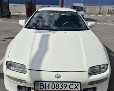 Білий Мазда 323, об'ємом двигуна 2 л та пробігом 430 тис. км за 2500 $, фото 1 на Automoto.ua