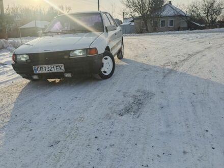 Білий Мазда 323, об'ємом двигуна 1.3 л та пробігом 1 тис. км за 1000 $, фото 1 на Automoto.ua