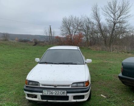 Белый Мазда 323, объемом двигателя 1.7 л и пробегом 300 тыс. км за 850 $, фото 1 на Automoto.ua