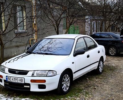 Білий Мазда 323, об'ємом двигуна 1.5 л та пробігом 398 тис. км за 1650 $, фото 1 на Automoto.ua