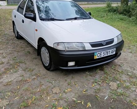 Білий Мазда 323, об'ємом двигуна 1.5 л та пробігом 423 тис. км за 1850 $, фото 1 на Automoto.ua